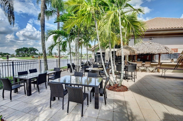 view of patio / terrace featuring a water view