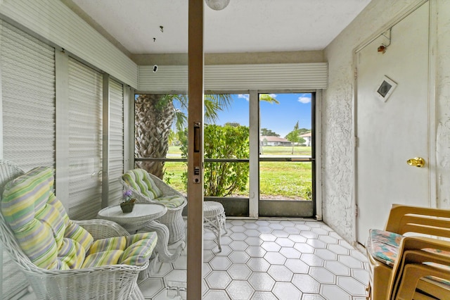 sunroom / solarium with a wealth of natural light