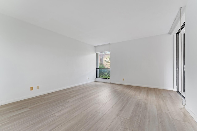 empty room featuring light hardwood / wood-style floors