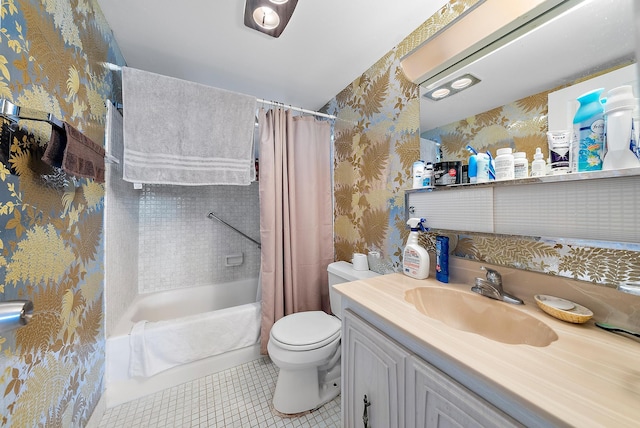 full bathroom featuring tile patterned floors, vanity, shower / bath combination with curtain, and toilet