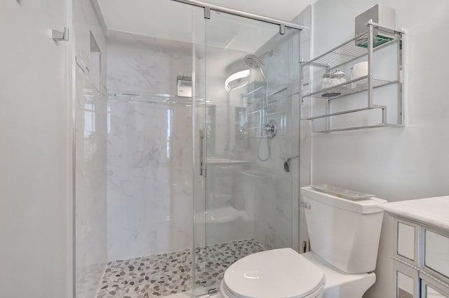 full bathroom featuring a marble finish shower and toilet