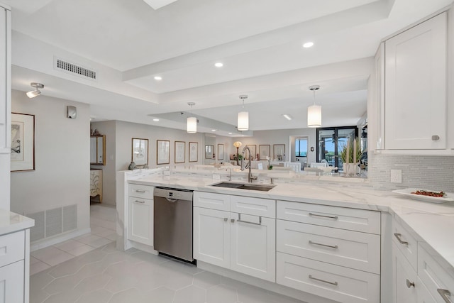 kitchen featuring a sink, visible vents, white cabinets, and dishwasher