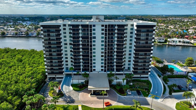 birds eye view of property featuring a water view