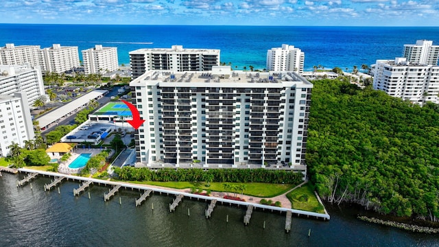 birds eye view of property featuring a water view