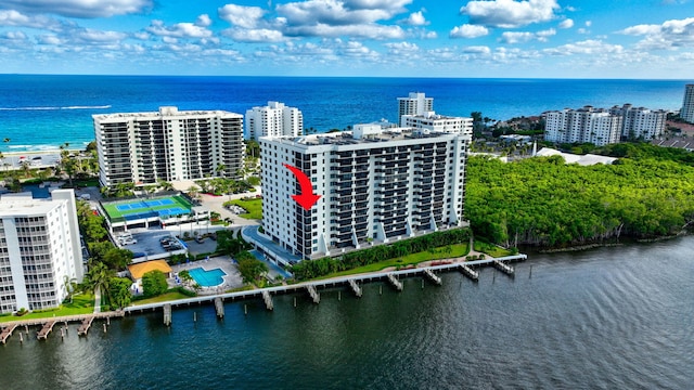 bird's eye view featuring a water view and a view of city