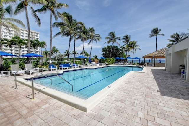 pool with a patio area