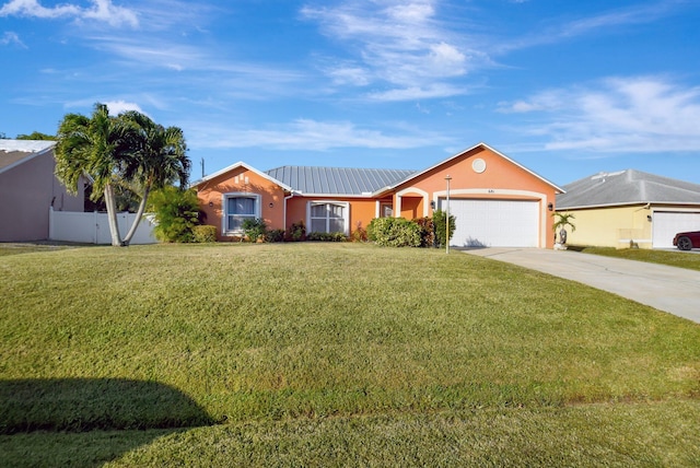 ranch-style home featuring a front lawn and a garage