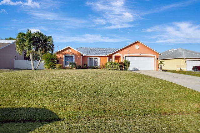 ranch-style house featuring a garage and a front lawn