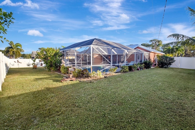 view of yard featuring a lanai