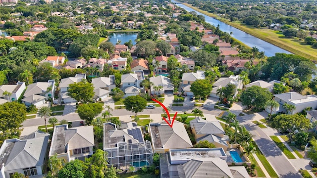 bird's eye view with a water view