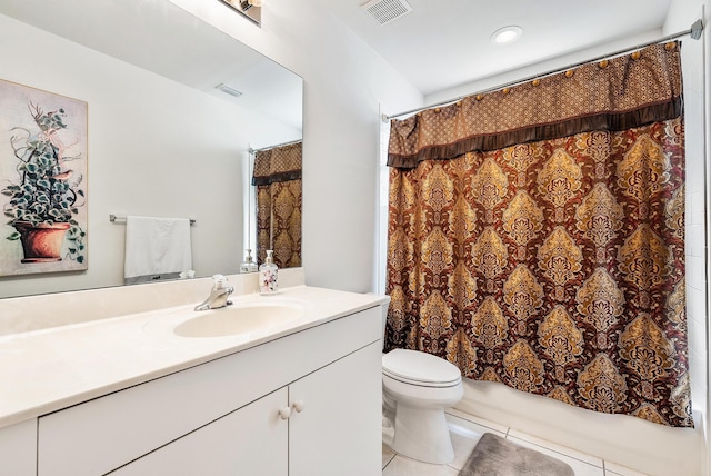 full bathroom with tile patterned floors, vanity, toilet, and shower / tub combo