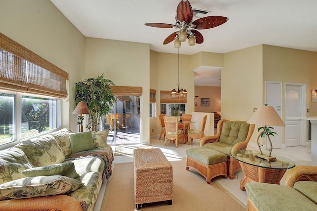 living room featuring ceiling fan and light colored carpet