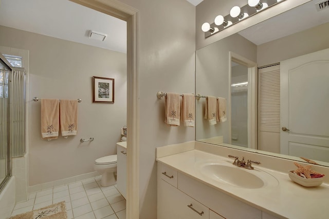 full bathroom with tile patterned flooring, vanity, toilet, and shower / bath combination with glass door