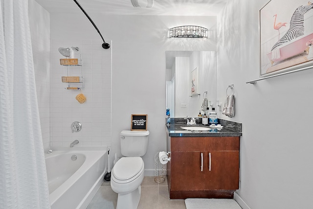 bathroom with tile patterned floors, toilet, shower / bath combination with curtain, baseboards, and vanity