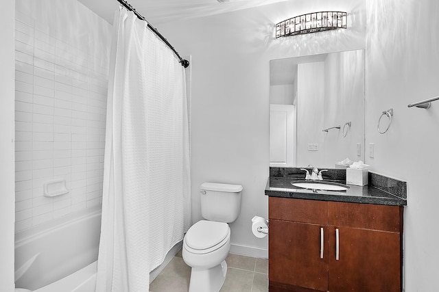 300 S Australian Ave Unit 520, West Palm Beach, FL 33401 - bathroom with vanity, toilet, shower / bath combo with shower curtain, tile patterned flooring, and baseboards
