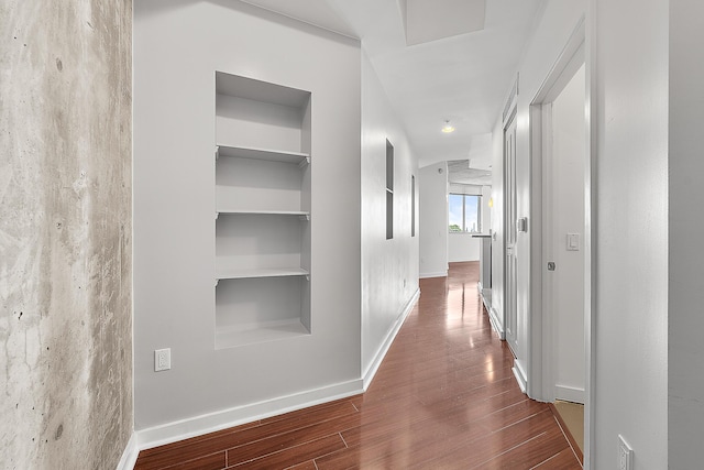 300 S Australian Ave Unit 520, West Palm Beach, FL 33401 - hall with wood finished floors, baseboards, and built in features