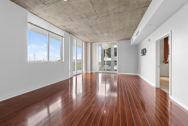 300 S Australian Ave Unit 520, West Palm Beach, FL 33401 - empty room featuring hardwood / wood-style floors and baseboards