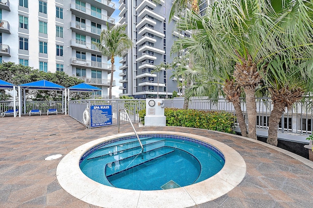 300 S Australian Ave Unit 520, West Palm Beach, FL 33401 - view of swimming pool with a community hot tub