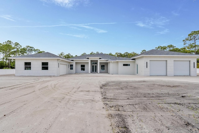 single story home featuring a garage