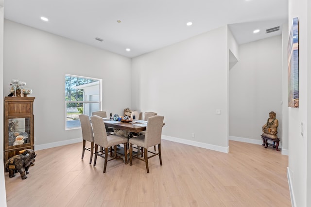 dining room featuring light hardwood / wood-style floors