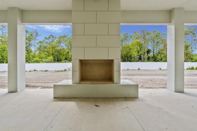 view of patio / terrace with exterior fireplace