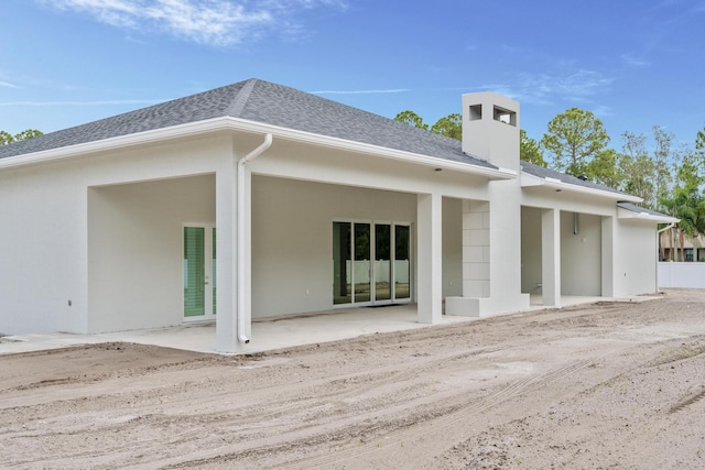 back of house featuring a patio