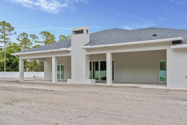 rear view of house with a patio area