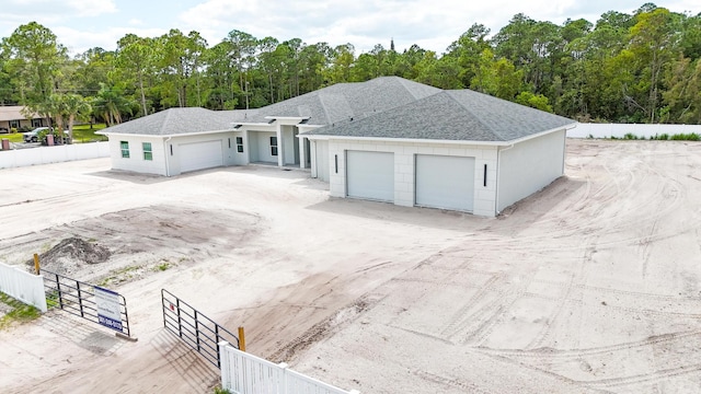 view of front of property with a garage