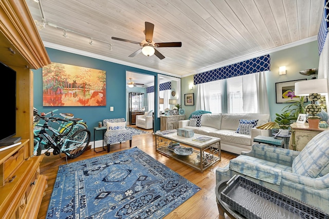 living room featuring rail lighting, light hardwood / wood-style floors, wooden ceiling, and ornamental molding