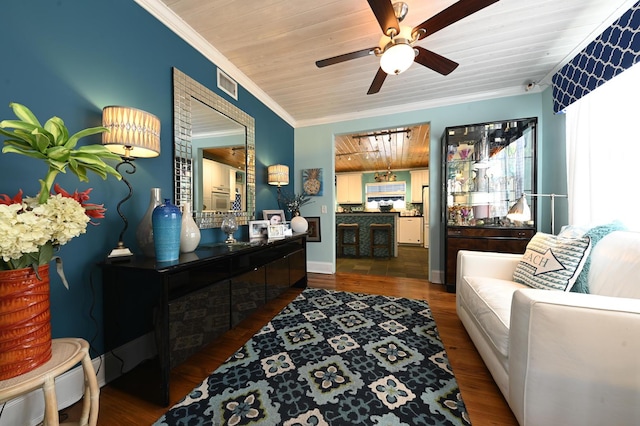 interior space with crown molding, dark hardwood / wood-style flooring, ceiling fan, and wood ceiling