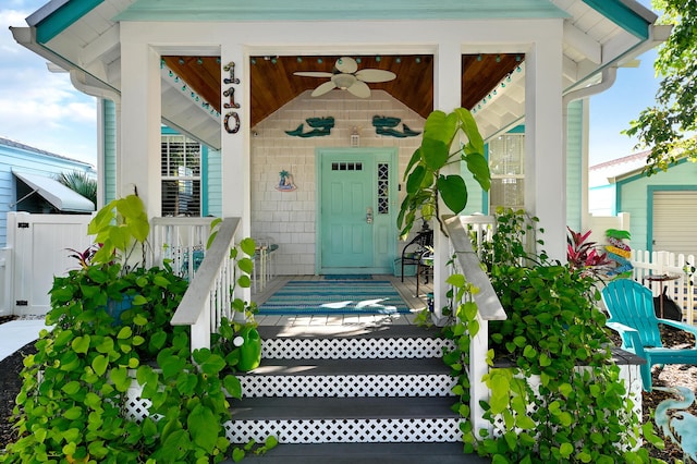 entrance to property featuring ceiling fan