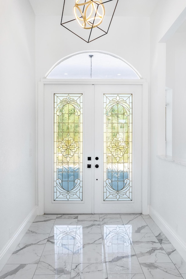 entrance foyer featuring french doors