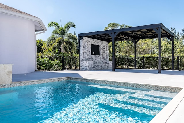 view of swimming pool featuring a patio area