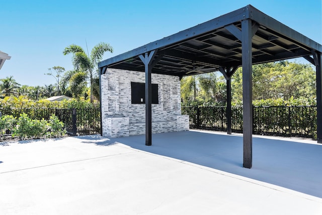 view of patio featuring a carport