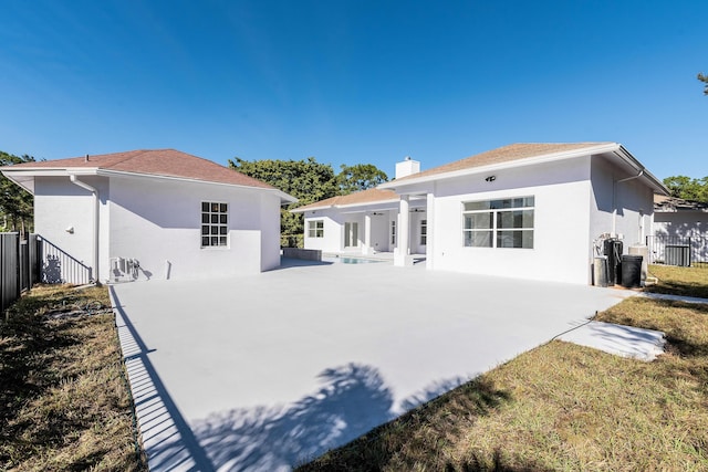 rear view of house with a patio