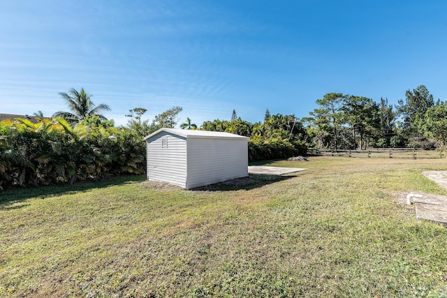 view of yard with a storage shed