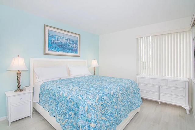 bedroom featuring light wood-type flooring