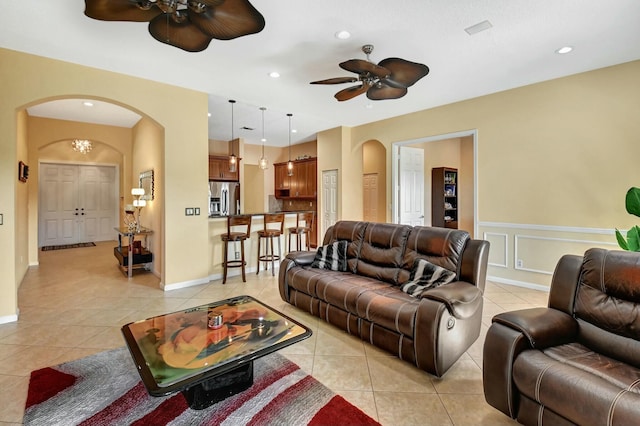 living room with light tile patterned flooring