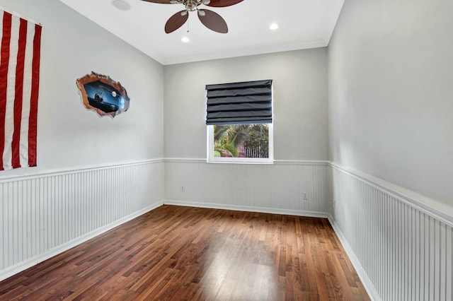 unfurnished room featuring hardwood / wood-style flooring, ceiling fan, and crown molding