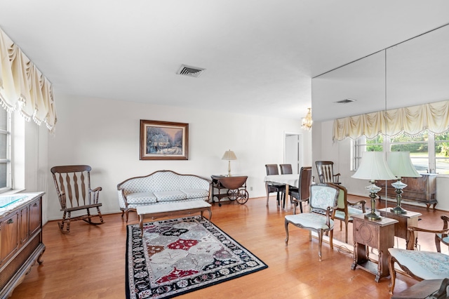 sitting room with hardwood / wood-style floors