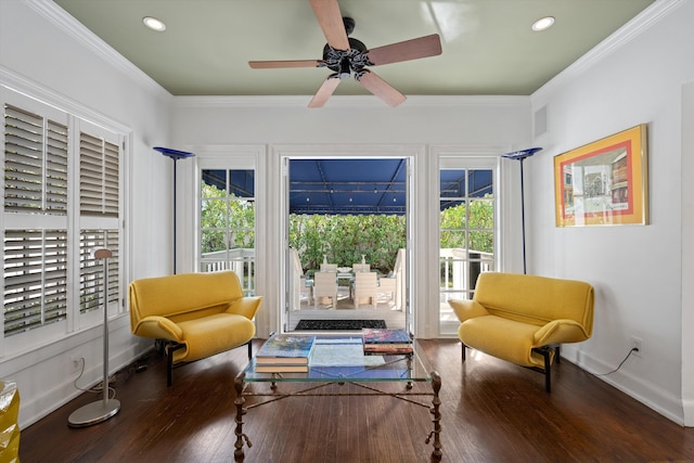 sitting room featuring ceiling fan, hardwood / wood-style floors, and ornamental molding