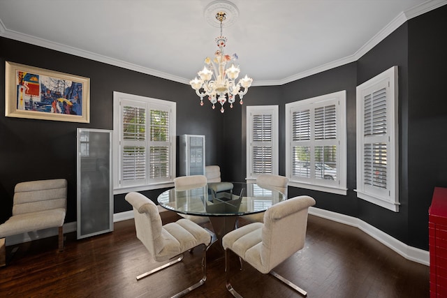 dining room with dark hardwood / wood-style floors, ornamental molding, and a chandelier