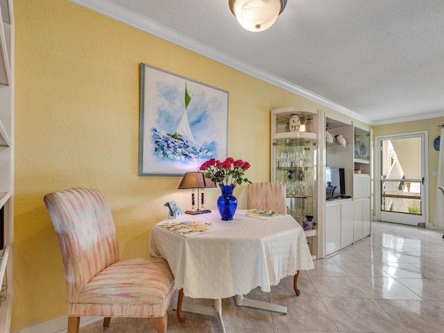 tiled dining space with crown molding