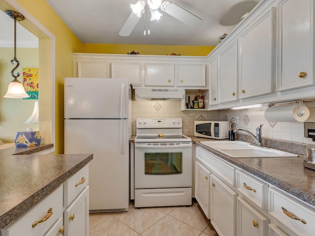 kitchen featuring white cabinets, white appliances, and range hood