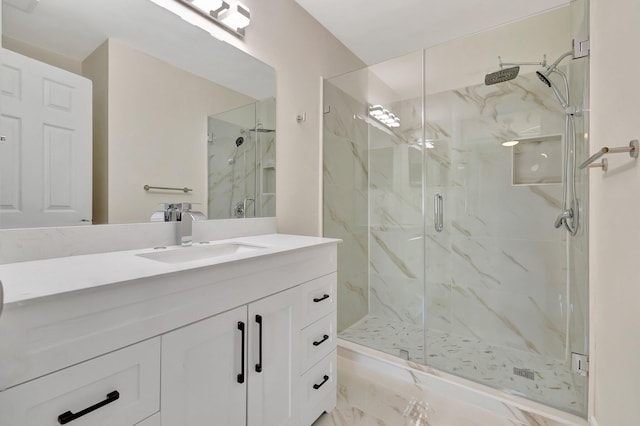 bathroom featuring vanity and walk in shower