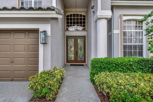 property entrance with a garage