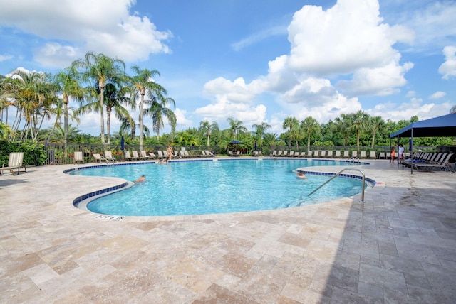 view of pool featuring a patio area