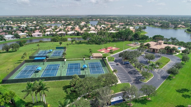 bird's eye view with a water view