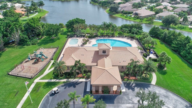 birds eye view of property featuring a water view