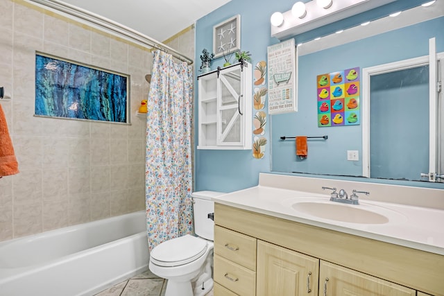 full bathroom featuring tile patterned flooring, shower / bath combo with shower curtain, vanity, and toilet